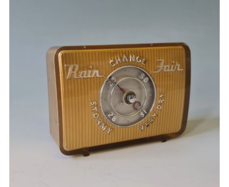 A Joseph Lucas art deco desktop barometer gold finished height approx 11 cm.