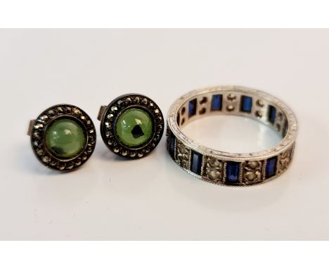 A pair of green hardstone stud earrings and a sapphire and paste full eternity ring, ring size P.