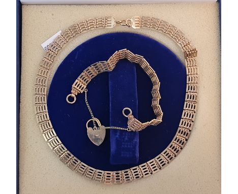 A hallmarked 9ct yellow gold gate style necklace approx.length 36cms, approx. weight 28.3gms (in box), together with a 5 bar 