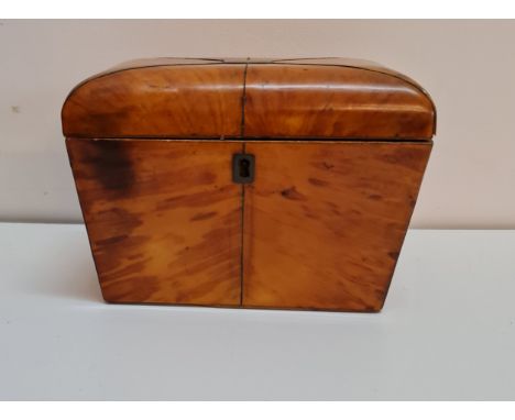 A early 19th century tortoiseshell tea caddy with inlaid white metal to top, height 13 cm.