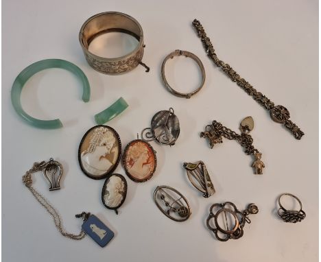 A collection of silver, some hallmarked, some stamped to include, two bangles, brooches, pendant, charm bracelet, wedgwood pe