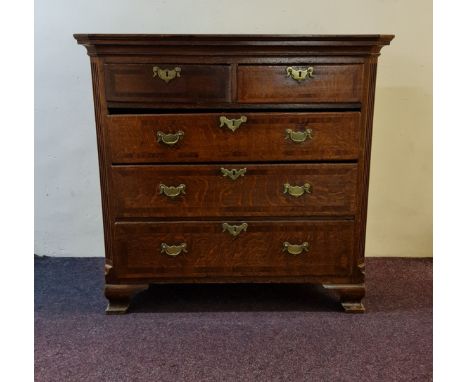 A 19th century oak five drawer chest on bracket feet.