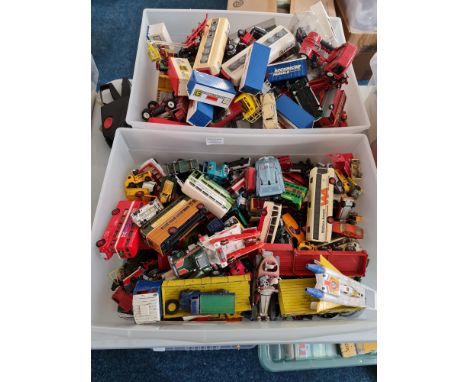 Two boxes of Corgi and Dinky vehicles.