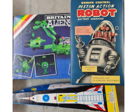 A Britain’s space alien set a reproduction Robot and rocket boxed.