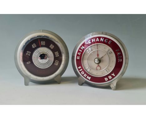 A Joseph Lucas art deco thermometer and barometer set silver and maroon.