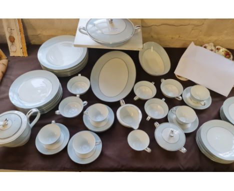 A Noritake Laureate dinner and tea service consisting of 12 plates, turean and cover, tea pot, milk jug, 12 side plates, six 