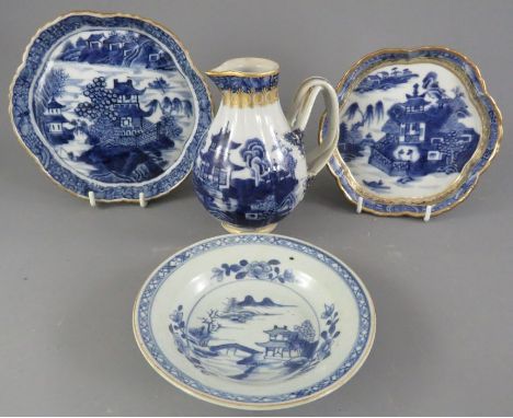 A group of blue and white hand-painted Chinese porcelain wares, c. 1760-80. To include: a sparrow-beak jug, two teapot stands