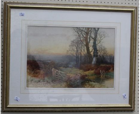 Edmund Gouldsmith ( British 1852-1932)Misty autumnal landscape with wooden gate and stile, watercolour , signed and dated 187