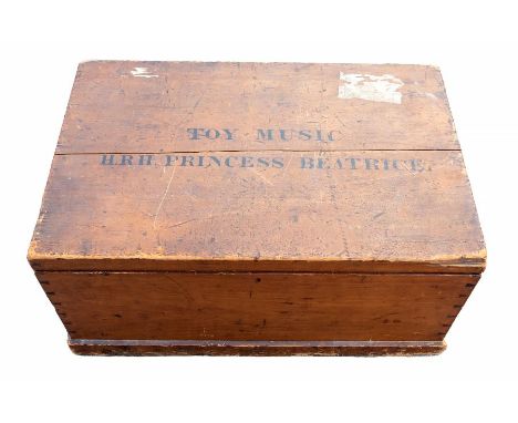 Royal Interest - A 19th century stained pine chest, painted black inscription 'Princess Beatrice Toy Music'Princess Beatrice 