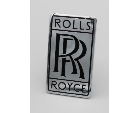 A Pre war chrome and black enamel Rolls Royce radiator badge, height 7cm