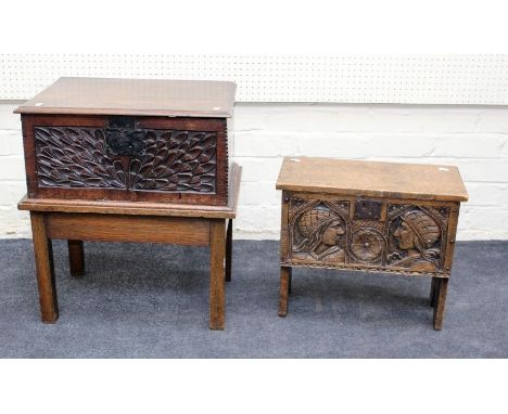An 18th century Bible box with fan leaf carved front panel on a later stand, 61 x 56cm together with a figurally carved elm b