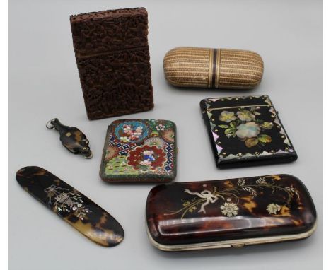 A collector's lot to include: Asian carved cinnabar card card case; papier mache glasses case, geometric decoration; Japanese