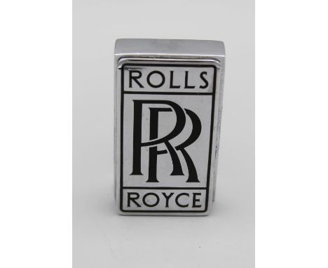 A pre war chrome and black enamel Rolls Royce radiator badge, with plinth, height 7.5cm