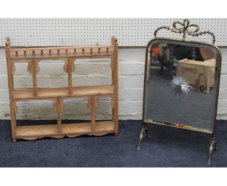 An Edwardian pine wall mounting display shelf with spindle turned gallery, 60 x 60cm together with a brass framed mirrored fi