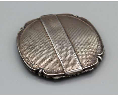 A silver compact hallmarked Birmingham 1948, gross weight approx 86gm