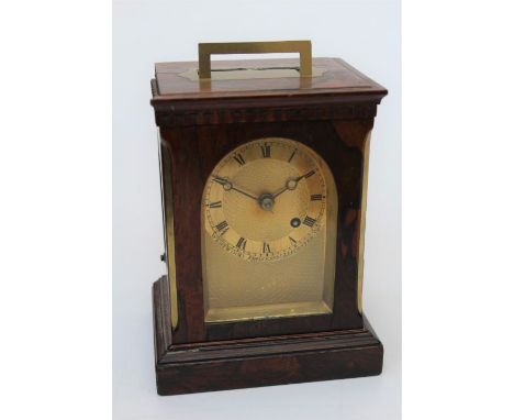Westwood, Princess St Leicester Square, London. An early 19th century rosewood mantle clock. The chamfered brass inlaid recta