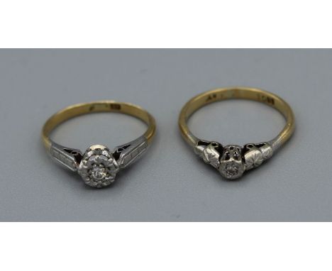 A pair of Art Deco Era diamond solitaire rings. Both stamped 18ct and Plat. One size M the other size K. Total gross weight 4