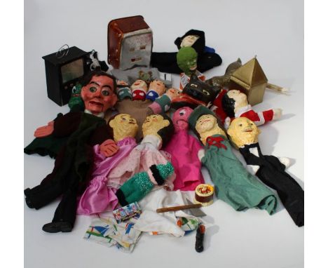A collection of approximately one dozen mid 20th century home made papier-mâché glove and other puppets, including a ventrilo