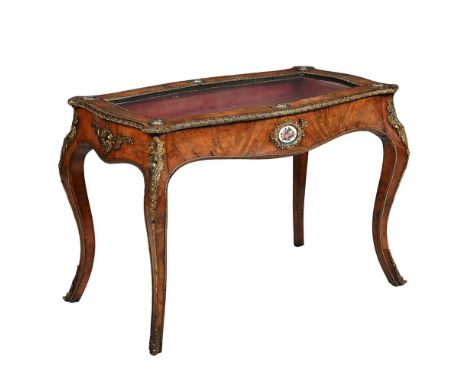 A VICTORIAN WALNUT AND GILT METAL MOUNTED DISPLAY TABLE OR VITRINE IN LOUIS XV STYLE, MID-19TH CENTURY  The glazed shaped rec