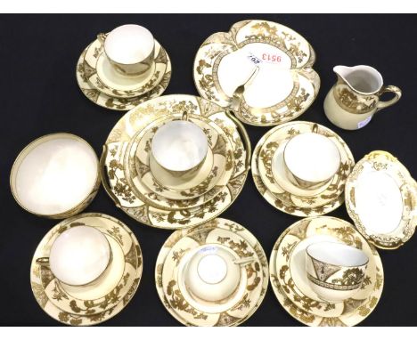 Twenty three piece set tea service by Noritake, cream ground and heavy gilt decoration. Light wear to gilt otherwise no crack