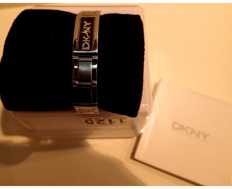 DKNY; ladies boxed stainless steel wristwatch. P&amp;P Group 1 (£14+VAT for the first lot and £1+VAT for subsequent lots) 
