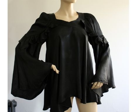 Late 1960s Ossie Clark for Radley black silk satin, bias cut, smock top with statement trumpet sleeves. It features a diamond