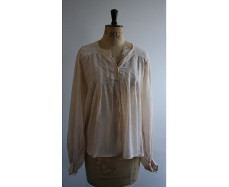 1960s Jeff Banks cotton viole smock top. Features puffed blouson sleeves, back and front yoke design leading into stitched pl
