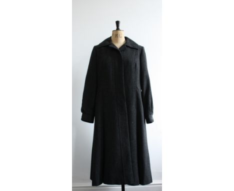 1970s Ladies Aquascutum pure new wool overcoat. Dark grey wool, princess line, button front, Gathered cuffed sleeves and reve