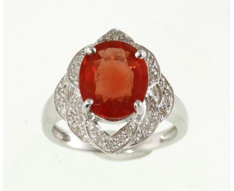 An 18ct white gold ruby (treated) & diamond ring, the central stone approx 3ct, weight approx 6.6gms, size N