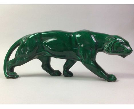 FOUR CERAMIC MODELS OF LARGE CATS, in black, green, white and maroon46cm longQty: 4Crazing, some glazing imperfections, chip 