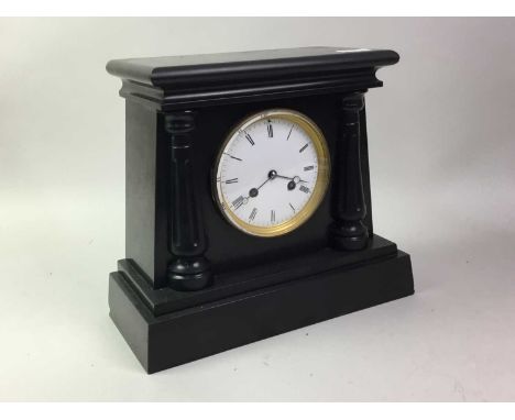 BLACK SLATE MANTEL CLOCK, the white dial set with Roman numerals30cm highScratches and stains present to the slate, chip pres