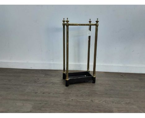 BRASS FOUR DIVISION STICK STAND, of rectangular form with square supportsQty: 61cm high