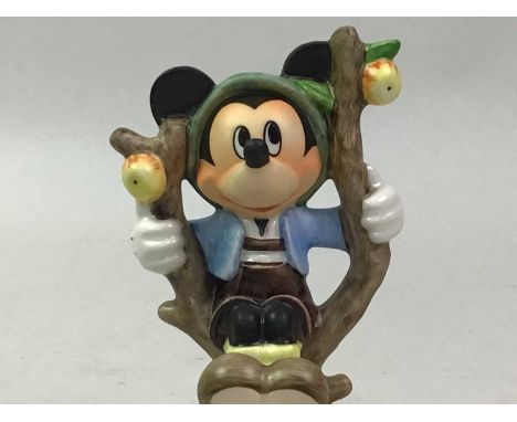TWO HUMMEL/GOEBEL DISNEY FIGURINES, comprising 'Apple Tree Mickey Mouse' No. 17 333 11 and 'Apple Tree Minnie Mouse' No. 17 3