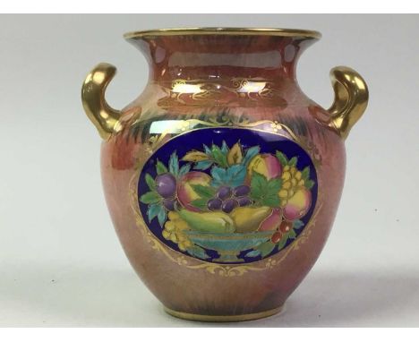 MINTONS, LUSTRE WARE VASE, twin handled, decorated with fruit against navy reserves, marked to base11.5cm high