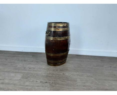 OAK COPPERED BARREL STICK STAND, with brass rings and handles53cm high
