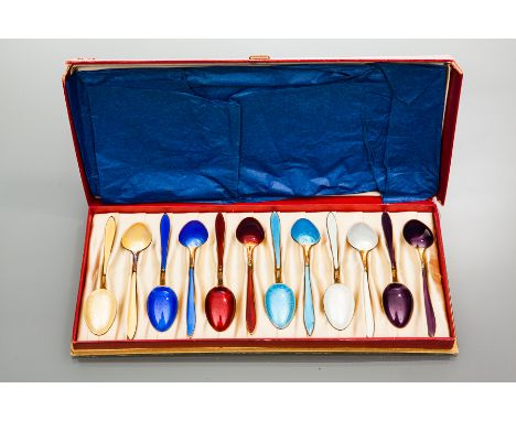 SET OF TWELVE MID-20TH CENTURY NORWEGIAN SILVER GILT ENAMEL COFFEE SPOONS
maker David-Andersen, stamped 'Norway' with '925' s