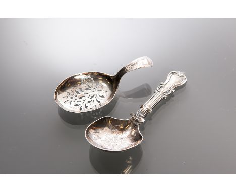 TWO 19TH CENTURY SILVER CADDY SPOONS
including a Victorian spoon, maker George Unite, date letter partially rubbed, possibly 