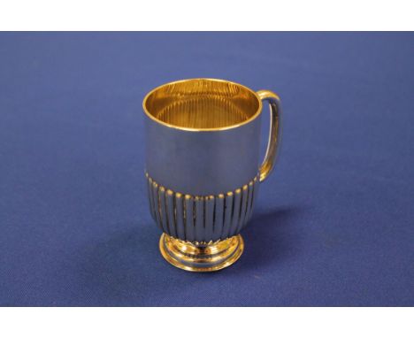 GEORGE V SILVER CHRISTENING MUG
maker William Hutton & Sons Ltd, Sheffield 1912, partially gadrooned, approximately 107g, 9cm
