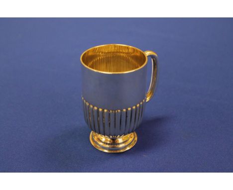 GEORGE V SILVER CHRISTENING MUG
maker William Hutton & Sons Ltd, Sheffield 1912, partially gadrooned, approximately 107g, 9cm