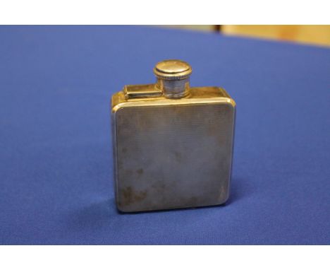 GEORGE V SILVER HIPFLASK
maker's mark rubbed, possibly A G Sheppard Ltd, Birmingham 1928, of square form, engine turned front