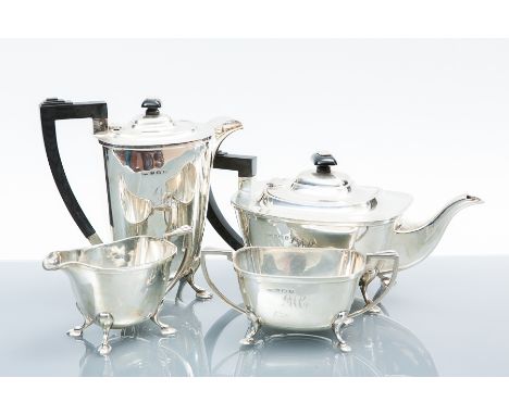 SILVER FOUR PIECE TEA SERVICE
maker Duncan & Scobbie, Birmingham 1937, of rectangular form, each on four short legs and with 