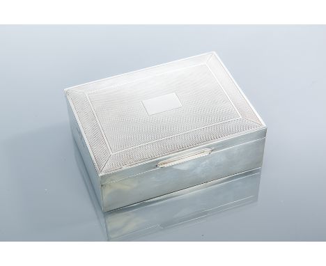 SILVER CIGARETTE BOX
maker Harman Brothers, Birmingham 1954, with engine turned lid, lacking engraving, approximately 299g (b