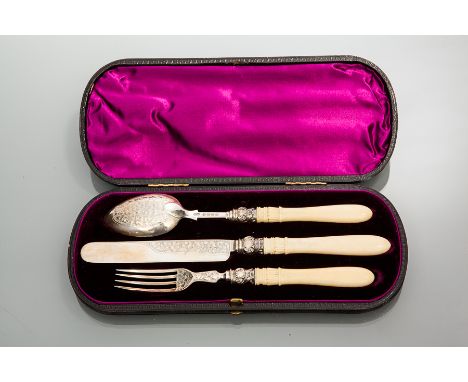 VICTORIAN SILVER AND IVORY HANDLED CHRISTENING SET
maker George Unite & Sons, Birmingham 1884, comprising a spoon, fork and k