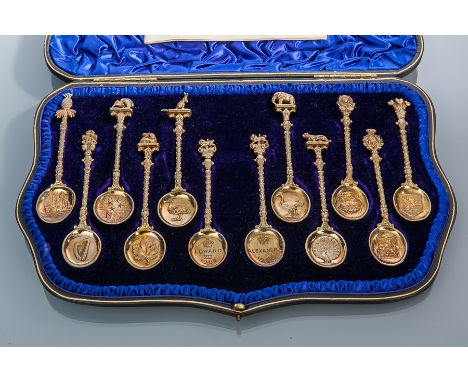 SET OF TWELVE EDWARDIAN SILVER GILT SOUVENIR SPOONS
maker Edward Barnard & Sons Ltd, London 1906, named 'The Greater Britain 