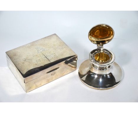 An Indian Colonial silver cigarette box with presentation inscription 'RGC Innes Cup 1938', Warner Brothers (Delhi) to/w a sm
