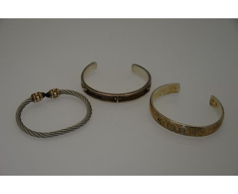 Two silver open bangles and one twisted wire open bangle, approx 94.7g all in, 6.5-7 cm open