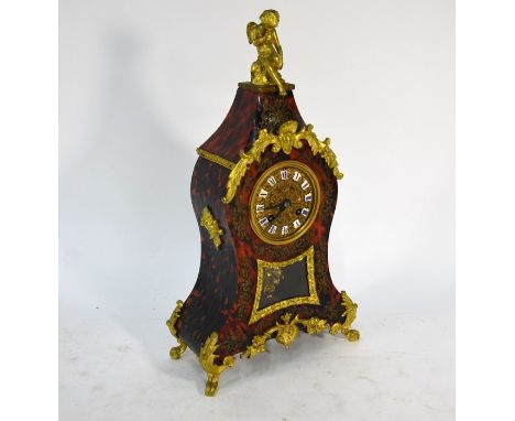 A giltwood mounted tortoiseshell mantle clock, with 8-day movement, 41 cm h o/all, a/f