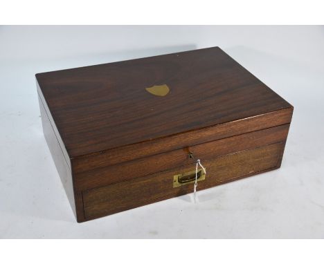 An Elkington &amp; Co mahogany canteen with lower drawer, fitted with a set of electroplated old English pattern flatware for