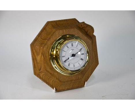 A Thompson of Kilburn 'Mouseman' oak octagonal wall clock with brass drum-cased battery movement, 19 cm wideGood condition, c