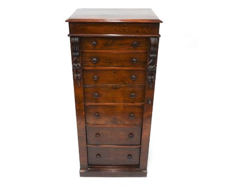 Victorian rosewood secretaire Wellington chest, comprising a cavetto drawer over two drawers, a pair of dummy drawer fronts e